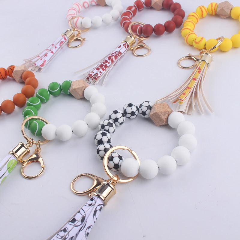 Llavero de muñeca con cuentas de silicona de fútbol al por mayor